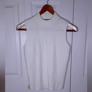 Soft fine knit, pearl white, sleeveless turtlneck womens top size L